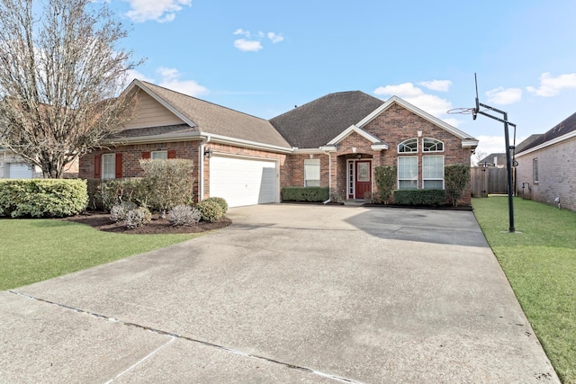 ranch-style home with a garage and a front lawn