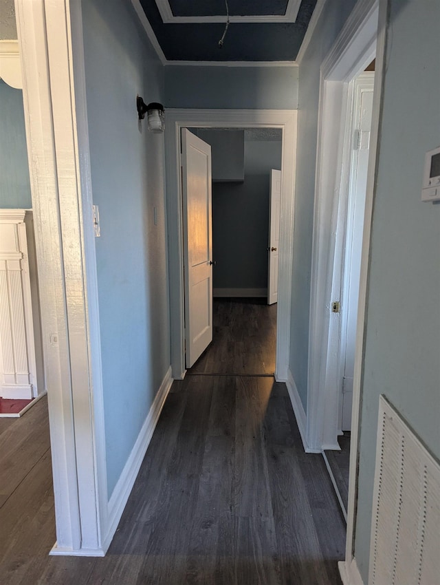 hallway featuring dark wood-type flooring