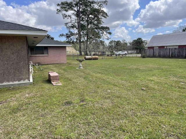 view of yard with fence