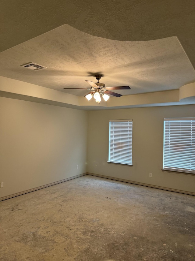 spare room featuring ceiling fan