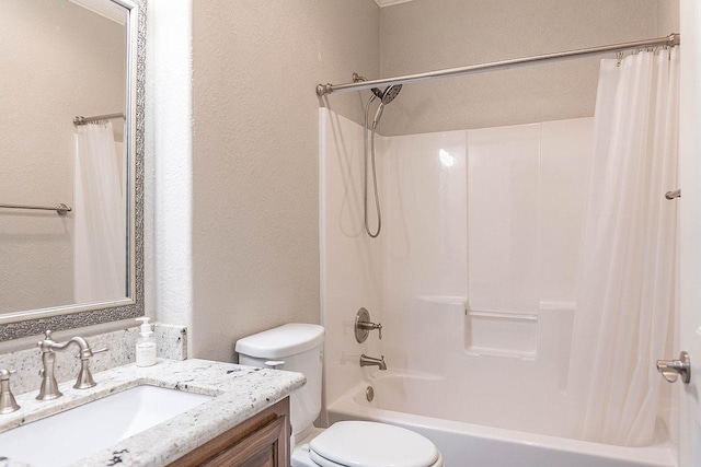 full bathroom with shower / bath combination with curtain, vanity, and toilet