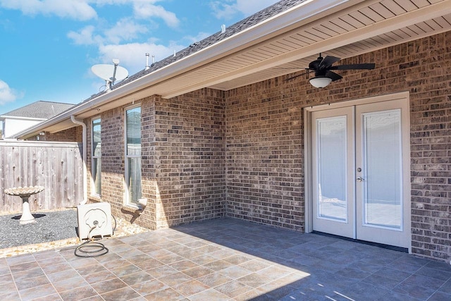 view of patio featuring ceiling fan and french doors