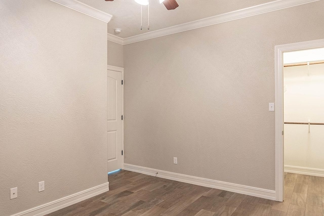 unfurnished room featuring crown molding, ceiling fan, and dark hardwood / wood-style floors