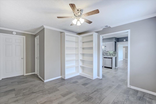 5960 Meadow Way, Beaumont, TX 77707 - empty room with a ceiling fan, light wood-style flooring, crown molding, and baseboards