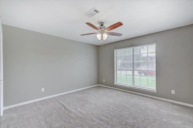 5960 Meadow Way, Beaumont, TX 77707 - spare room with carpet, baseboards, and a ceiling fan