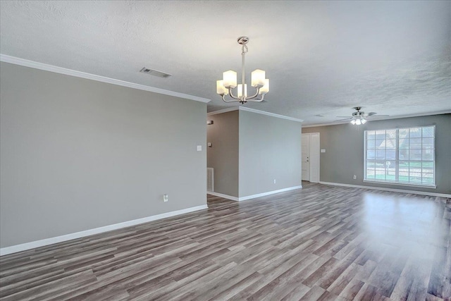 5960 Meadow Way, Beaumont, TX 77707 - empty room featuring wood finished floors, a chandelier, baseboards, ceiling fan, and a textured ceiling