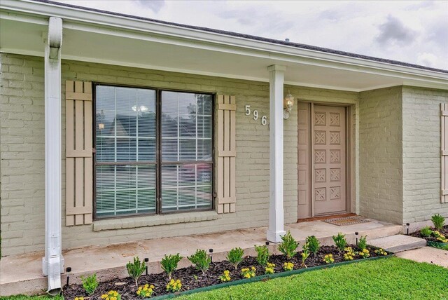 5960 Meadow Way, Beaumont, TX 77707 - entrance to property with brick siding