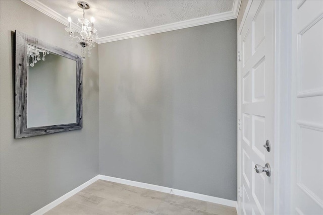 5960 Meadow Way, Beaumont, TX 77707 - unfurnished room with crown molding, a chandelier, baseboards, and a textured ceiling