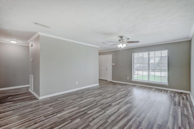 5960 Meadow Way, Beaumont, TX 77707 - empty room featuring a ceiling fan, wood finished floors, baseboards, crown molding, and a textured ceiling