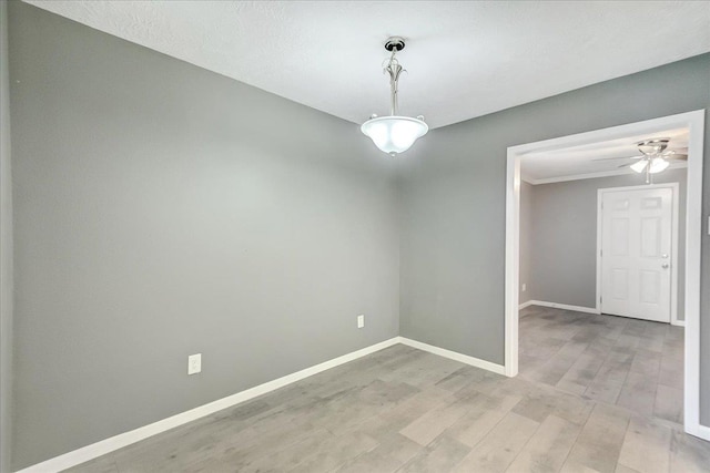 5960 Meadow Way, Beaumont, TX 77707 - spare room with ceiling fan, light wood finished floors, and baseboards