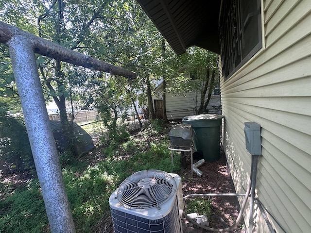 view of yard with central AC unit