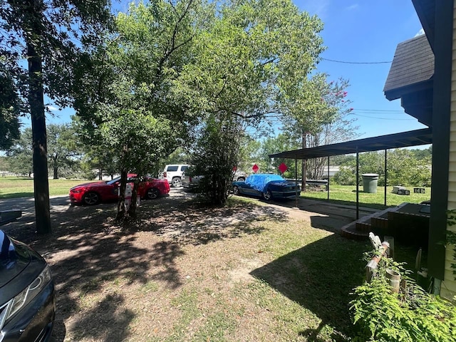 view of yard with a carport