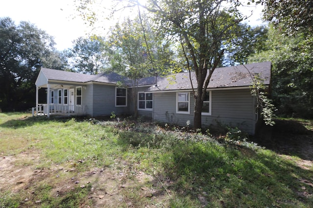 back of house with covered porch