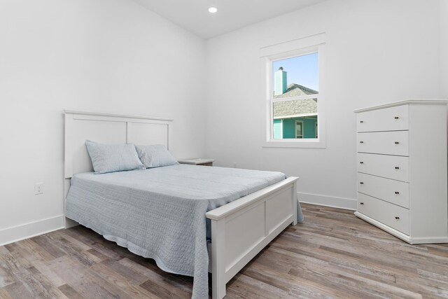 bedroom with light wood-type flooring