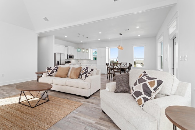 living room featuring light wood-type flooring