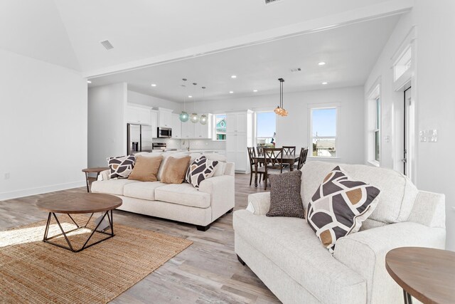 living room featuring light hardwood / wood-style floors