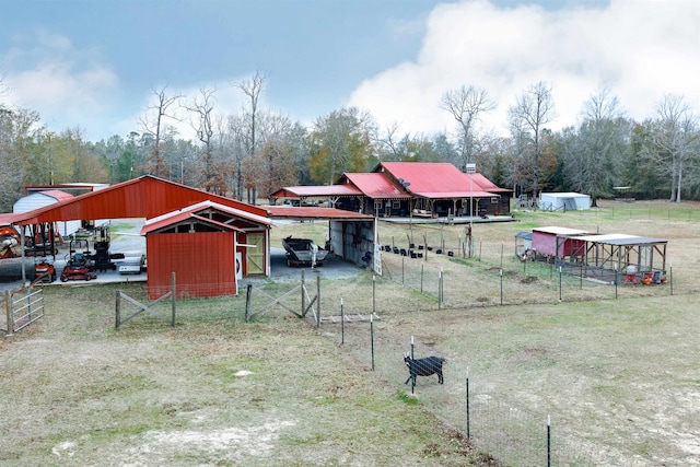 9861 Fm 1442, Orange, TX 77630 - view of yard featuring an outdoor structure and a carport