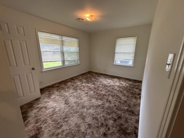 view of carpeted spare room