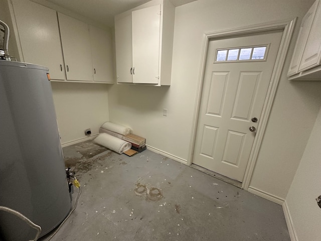 laundry room featuring electric dryer hookup, cabinets, and water heater