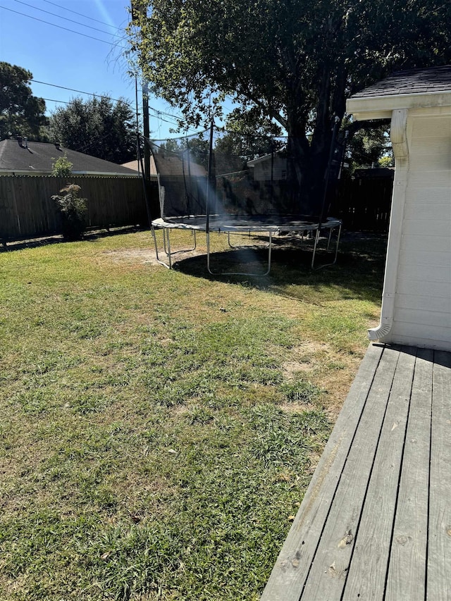 view of yard featuring a trampoline