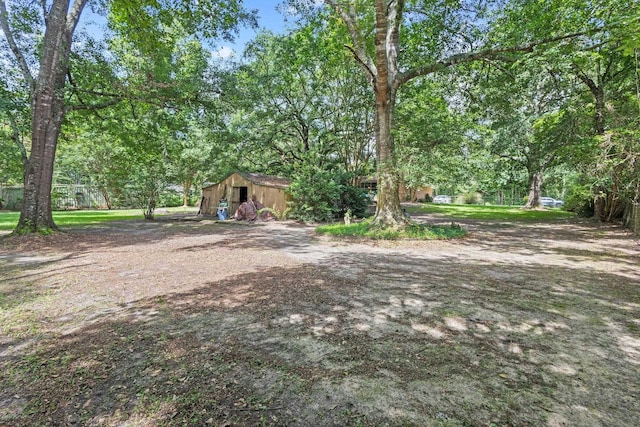 2836 Old Spurger Rd, Silsbee, TX 77656 - view of yard featuring an outbuilding