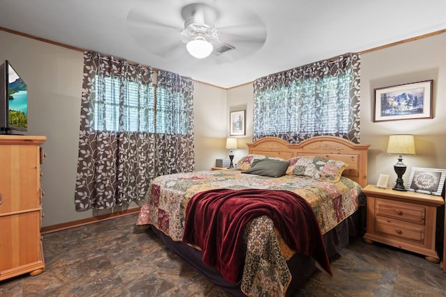 2836 Old Spurger Rd, Silsbee, TX 77656 - bedroom featuring stone finish flooring, crown molding, and a ceiling fan