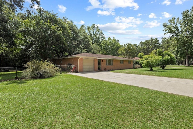 2836 Old Spurger Rd, Silsbee, TX 77656 - single story home featuring a garage, driveway, and brick siding