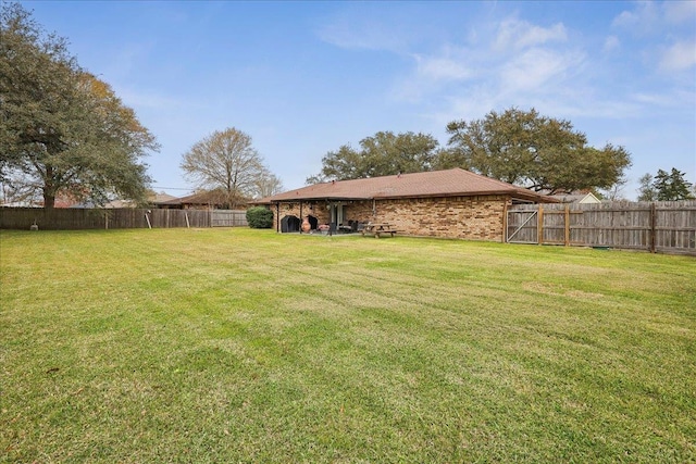 view of yard with fence