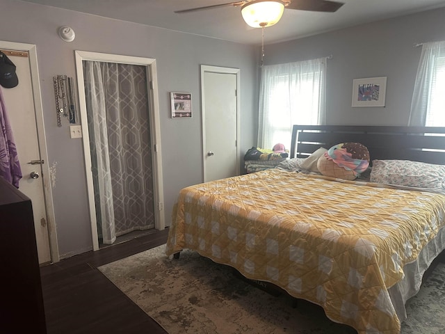 3104 Main Ave, Groves, TX 77619 - bedroom with wood finished floors and a ceiling fan
