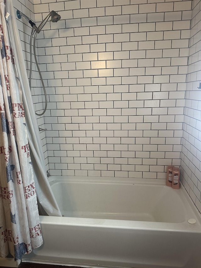 3104 Main Ave, Groves, TX 77619 - full bathroom with shower / bath combination with curtain