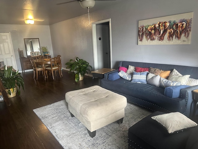 3104 Main Ave, Groves, TX 77619 - living area with hardwood / wood-style flooring, a ceiling fan, and baseboards