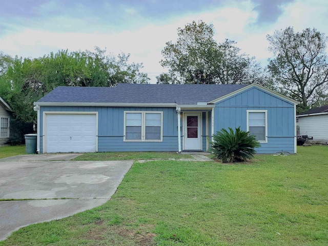 ranch-style home with a garage and a front yard