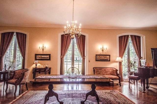 living area with parquet floors, an inviting chandelier, a healthy amount of sunlight, and ornamental molding