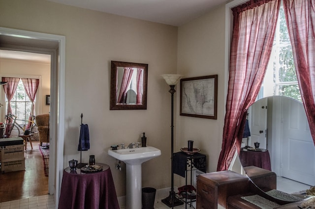 bathroom featuring tile patterned floors and sink