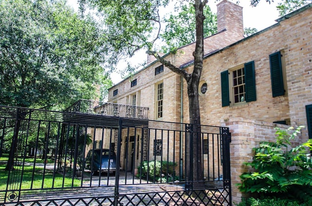 view of gate featuring a carport