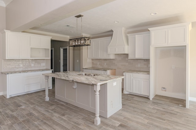 miscellaneous room featuring beam ceiling, a fireplace, a towering ceiling, and coffered ceiling