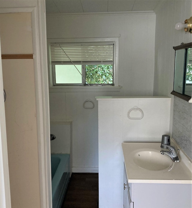 4701 Redbird St, Port Arthur, TX 77642 - bathroom with ornamental molding, vanity, and healthy amount of natural light