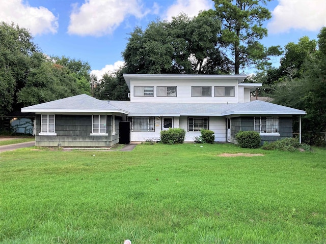 4701 Redbird St, Port Arthur, TX 77642 - view of front of house with a front lawn