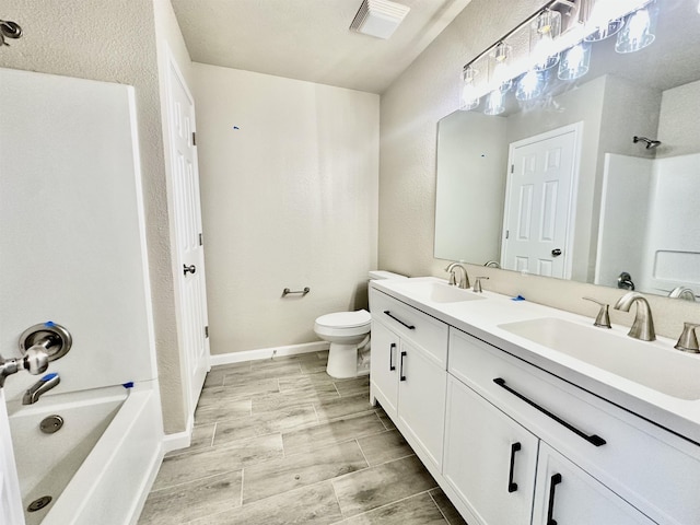 full bathroom with vanity, toilet, and shower / bathtub combination