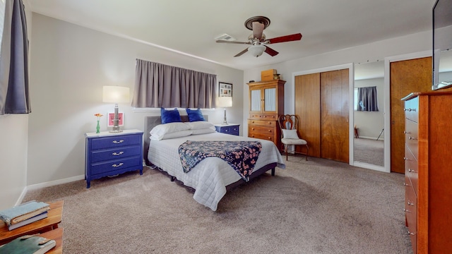 bedroom featuring a ceiling fan, carpet, and baseboards