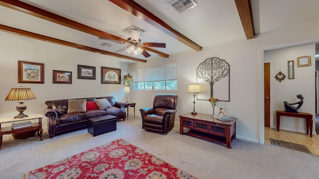 living room with visible vents, beam ceiling, ceiling fan, and carpet flooring