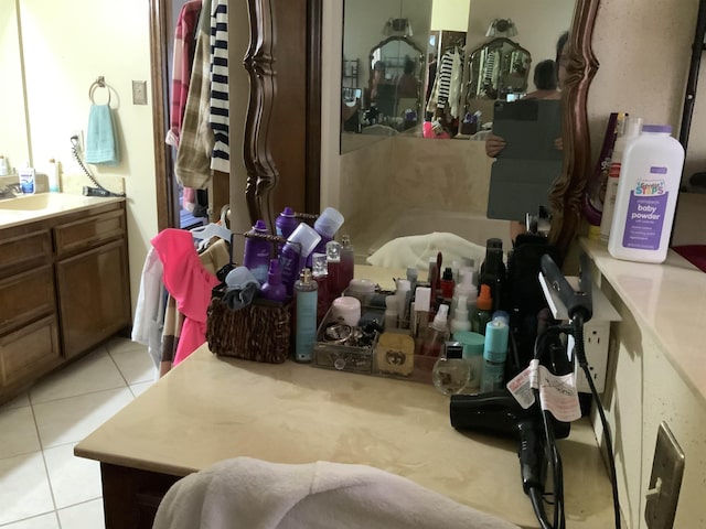 bathroom featuring tile patterned flooring and sink