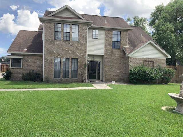 view of front property with a front lawn