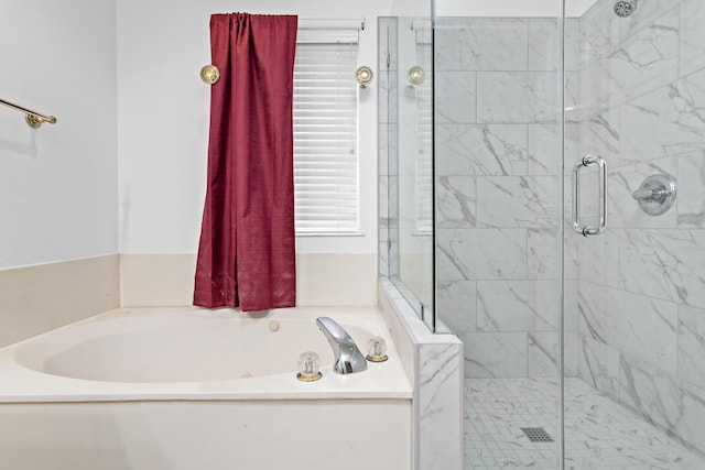 7845 Indian Blanket Dr, Beaumont, TX 77713 - bathroom featuring a stall shower and a garden tub