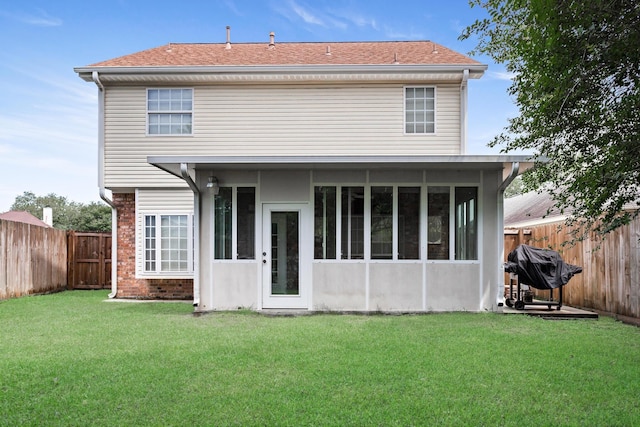 7845 Indian Blanket Dr, Beaumont, TX 77713 - rear view of property featuring a shingled roof and brick siding
