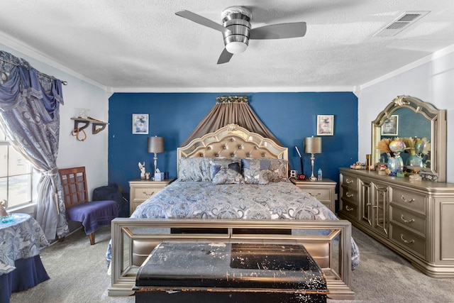 carpeted bedroom with a ceiling fan, a textured ceiling, visible vents, and crown molding