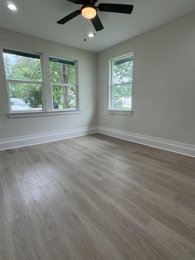 3022 S Drive, Groves, TX 77619 - empty room featuring recessed lighting, a ceiling fan, and wood finished floors