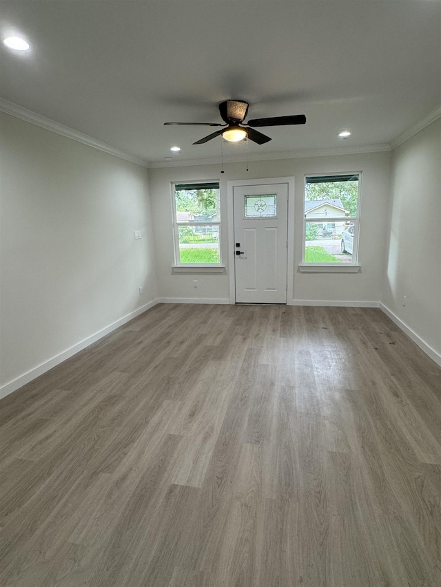 3022 S Drive, Groves, TX 77619 - foyer entrance featuring ornamental molding, wood finished floors, recessed lighting, and ceiling fan