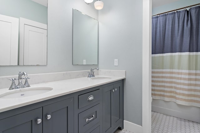 bathroom with shower / bath combination with curtain and vanity