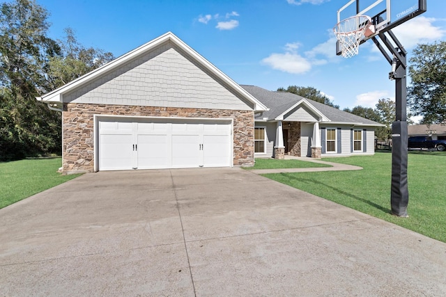 craftsman-style house featuring a garage and a front yard